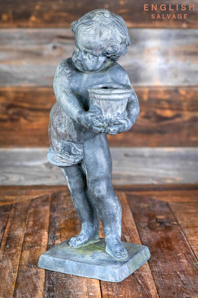 Small antique lead boy figure