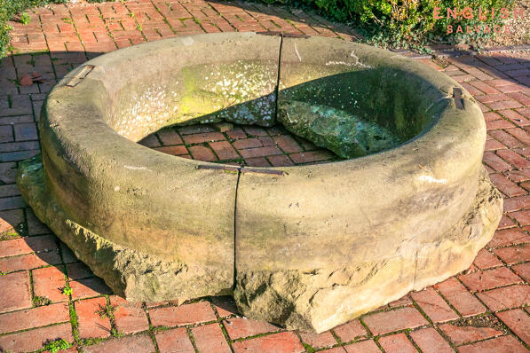 Small antique stone pond surround