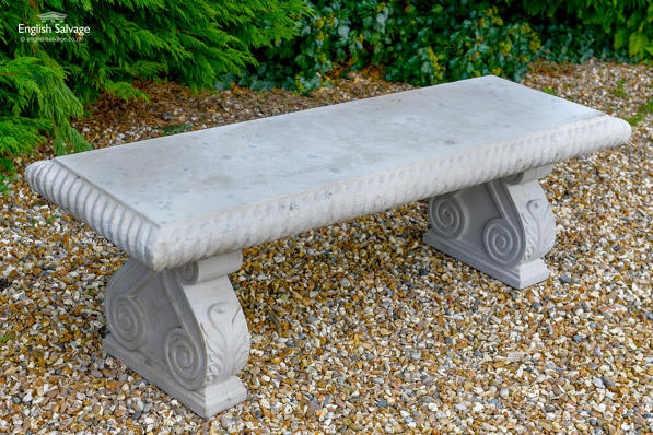 Stone bench with rope detail and scroll legs