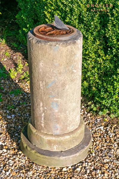 Stone sundial with cast iron plate/dial