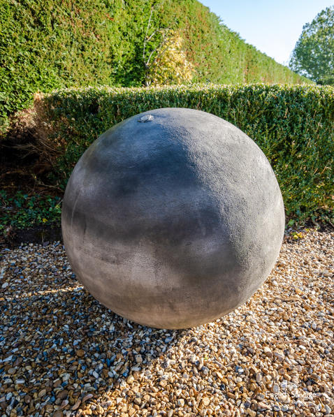Striking reconstituted stone sphere