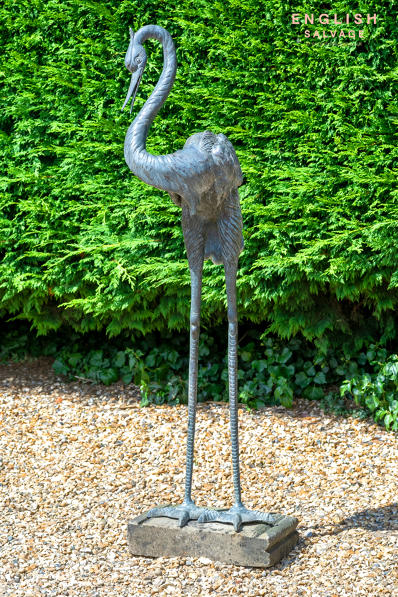 Tall antique bronze crane