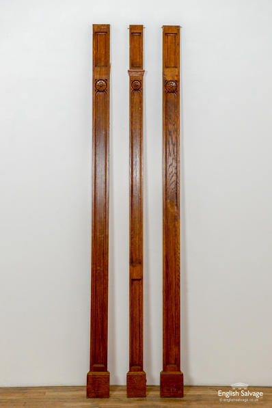three elegant reclaimed oak pilasters