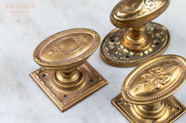 Three reclaimed door knobs