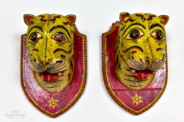 Two mounted carved tiger heads