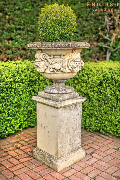 Weathered ornate centrepiece urn