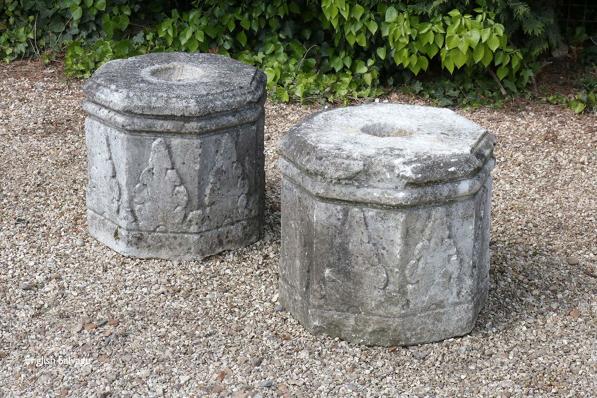 Weathered solid marble octagonal plinths