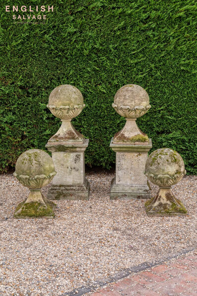 Weathered stone acanthus leaf ball pillars