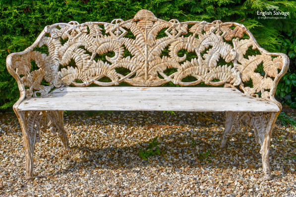 White painted cast iron and teak fern bench 