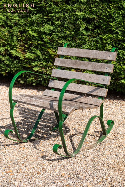 Wrought iron garden chair with wood slats